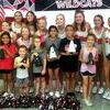 The Carnegie High School varsity cheerleaders presented several spirit awards to those attending the Sept. 18 cheer camp. Among the cheer camp participants earning spirit awards were Wynter Burcum (Pre-K), Charleigh Pinnell ) Kindergarten), Braeleigh Nesahkluah (First grade), Rosalee Gutierrez (Second grade), Julz Chavez (Third grade), Jrue Wallace (Fourth grade) and Yaretzi Villegas (Fifth grade). Those participating in the camp were able to show off their skills during the half of the Carnegie Wildcats' recent football game.
